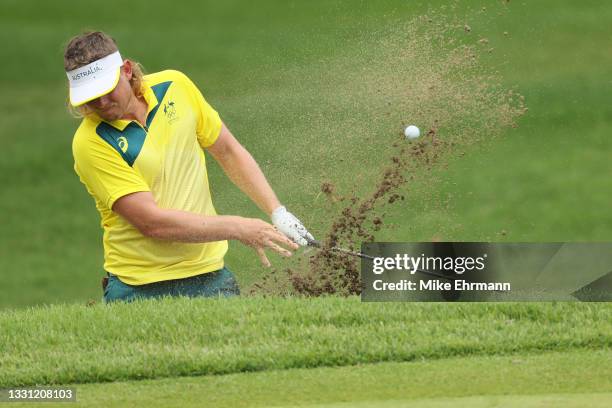 Cameron Smith of Team Australia plays a shot from a bunker on the third hole during the first round of the Men's Individual Stroke Play on day six of...