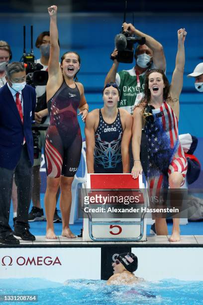 Kathryn McLaughlin, Paige Madden, Allison Schmitt and Katie Ledecky of Team United States react after winning the silver medal in the Women's 4 x...