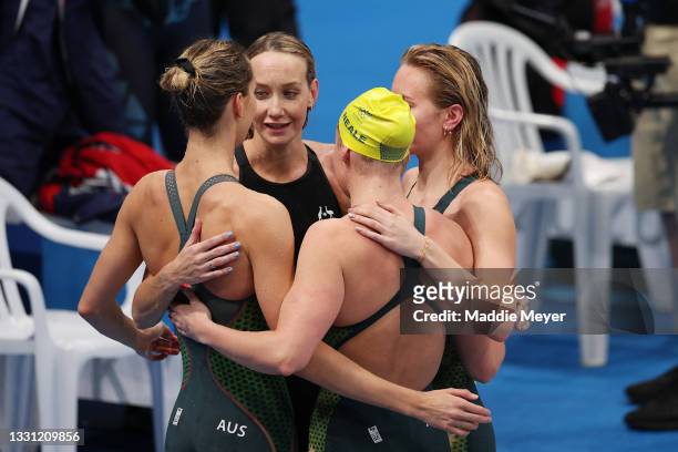 Emma McKeon, Ariarne Titmus, Madison Wilson and Leah Neale of Team Australia embrace after winning the bronze medal in the Women's 4 x 200m Freestyle...