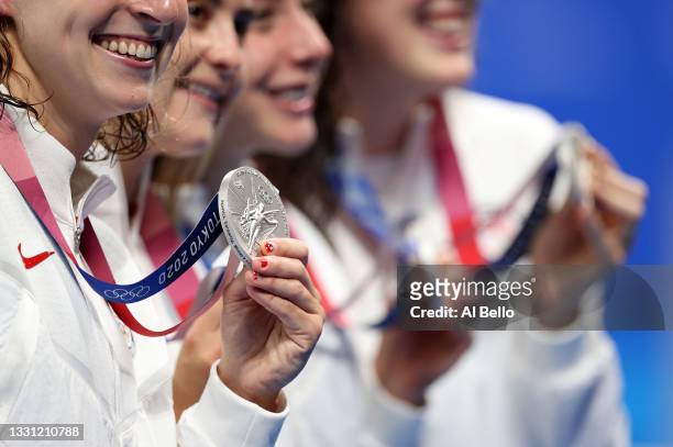 Katie Ledecky, Kathryn McLaughlin, Paige Madden and Allison Schmitt of Team United States pose with their silver medals during the medal ceremony for...