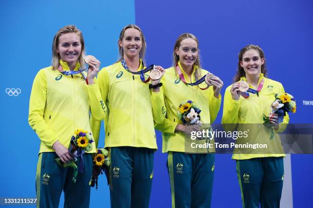 Bronze medalists Ariarne Titmus, Emma McKeon, Madison Wilson and Leah Neale of Team Australia pose with the bronze medal for the Women's 4 x 200m...