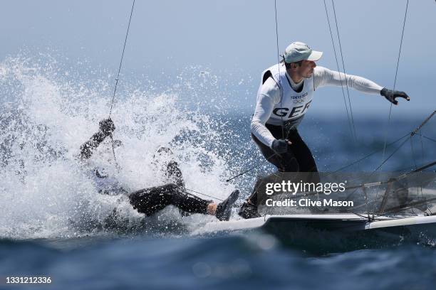 Erik Heil and Thomas Ploessel of Team Germany compete in the Men's Skiff 49er class on day six of the Tokyo 2020 Olympic Games at Enoshima Yacht...