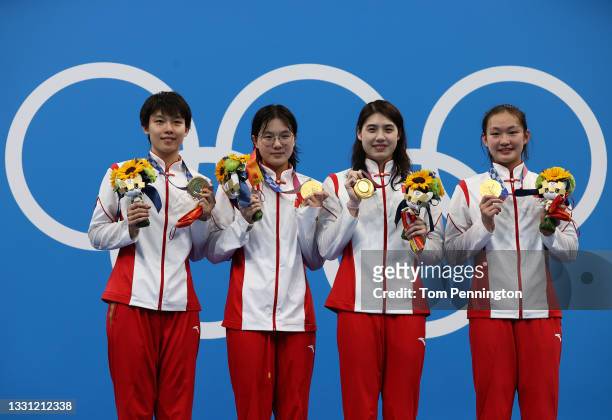 Gold medalists Junxuan Yang, Yufei Zhang, Bingjie Li and Muhan Tang of Team China pose with their gold medals for the Women's 4 x 200m Freestyle...