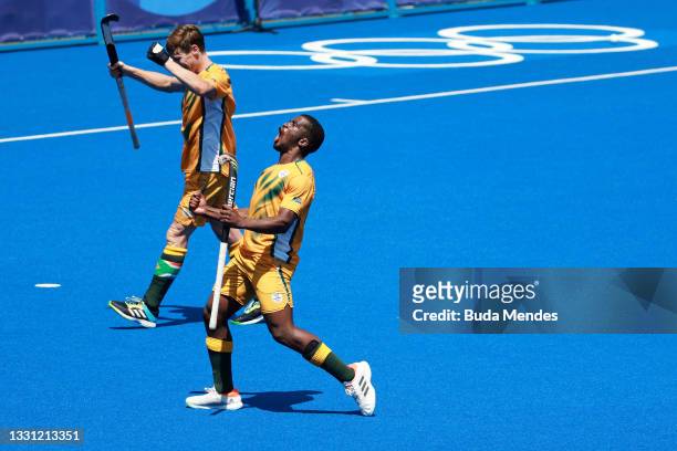 Samkelo Mvimbi of Team South Africa celebrates winning 4-3 against Team Germany after the Men's Preliminary Pool B match between South Africa and...