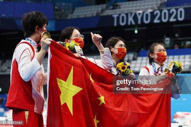 Gold medalists Junxuan Yang, Yufei Zhang, Bingjie Li and Muhan Tang of Team China pose with their gold medals for the Women's 4 x 200m Freestyle...