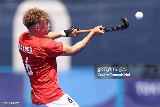 Jacob Benjamin Draper of Team Great Britain controls the ball during the Men's Preliminary Pool B match between Netherlands and Great Britain on day...