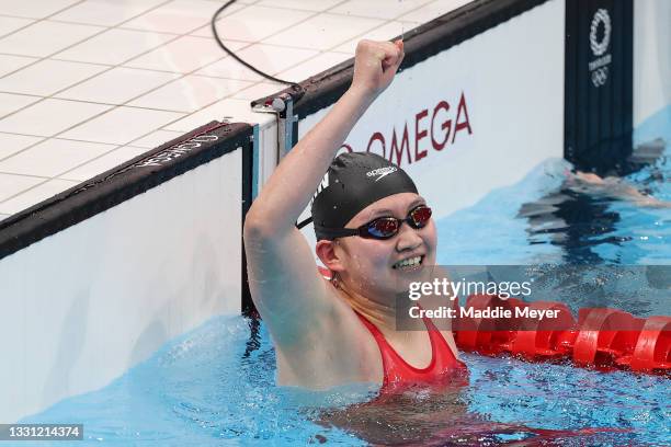 Li Bingjie of Team China celebrates winning gold in the Women's 4 x 200m Freestyle Relay Final on day six of the Tokyo 2020 Olympic Games at Tokyo...