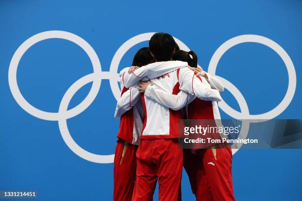 Gold medalist Junxuan Yang, Yufei Zhang, Bingjie Li and Muhan Tang of Team China pose with their gold medals for the Women's 4 x 200m Freestyle Relay...