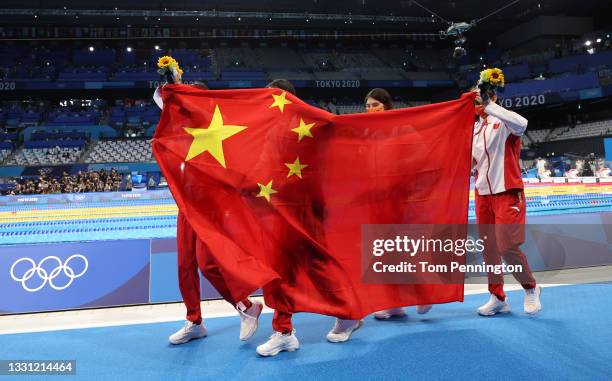 Gold medalist Junxuan Yang, Yufei Zhang, Bingjie Li and Muhan Tang of Team China pose after the medal ceremony for the Women's 4 x 200m Freestyle...