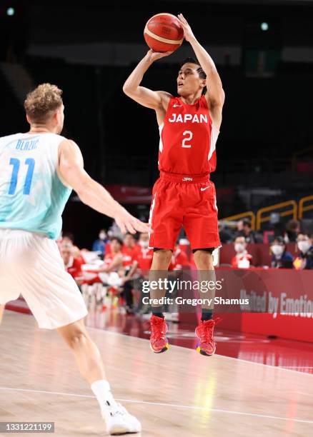 Yuki Togashi of Team Japan shoots against Slovenia during the second half of a Men's Preliminary Round Group C game on day six of the Tokyo 2020...