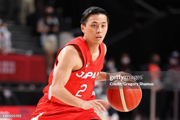 Yuki Togashi of Team Japan brings the ball up court against Slovenia during the second half of a Men's Preliminary Round Group C game on day six of...