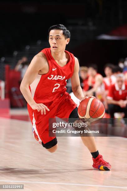 Yuki Togashi of Team Japan brings the ball up court during the second half of a Men's Preliminary Round Group C game on day six of the Tokyo 2020...