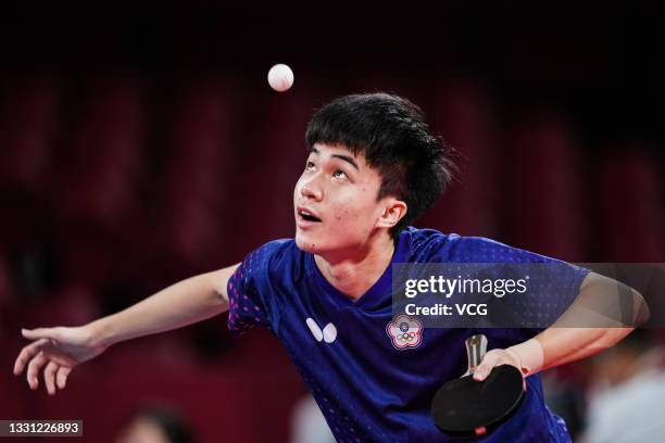 Lin Yun-ju of Chinese Taipei competes against Fan Zhendong of China during their men's singles semifinals table tennis match on day six of the Tokyo...