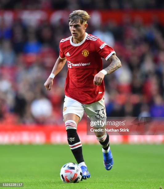 Brandon Williams of Manchester United runs with the ball during the pre-season friendly match between Manchester United and Brentford at Old Trafford...