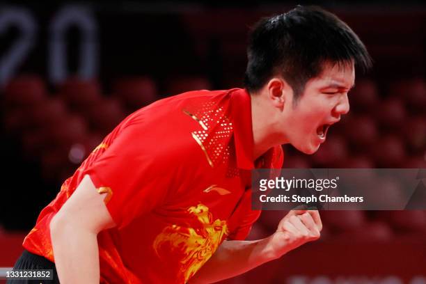 Fan Zhengdong of Team China reacts during his Men's Singles Semifinals match on day six of the Tokyo 2020 Olympic Games at Tokyo Metropolitan...