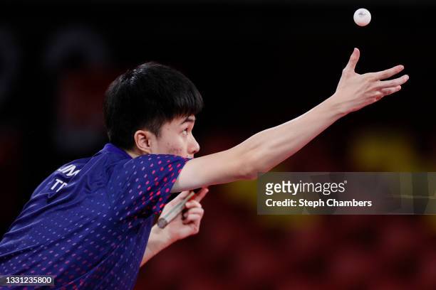 Lin Yun Ju of Team Chinese Taipei serves the ball during his Men's Singles Semifinals match on day six of the Tokyo 2020 Olympic Games at Tokyo...