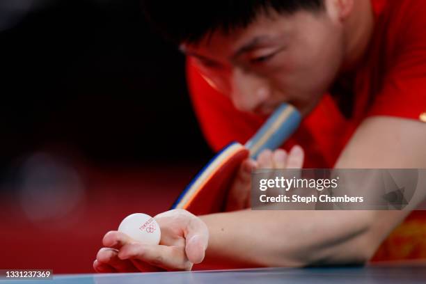 Ma Long of Team China serves the ball during his Men's Singles Semifinals match on day six of the Tokyo 2020 Olympic Games at Tokyo Metropolitan...