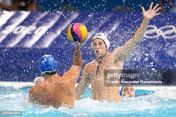 Marko Vavic of Team United States defends against Francesco di Fulvio of Team Italy during the Men's Preliminary Round Group A match between the...