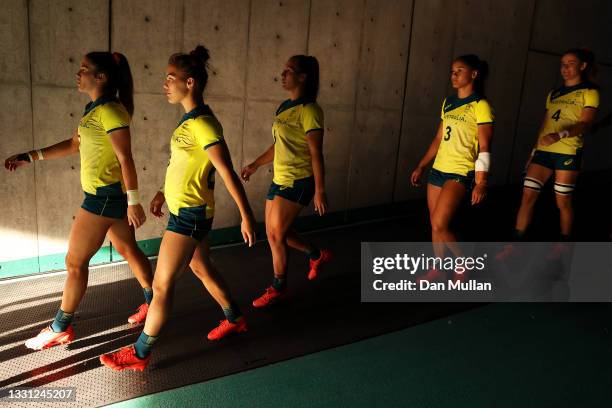 The Team Australia players prepare to take the field in the Women’s pool C match between Team Australia and Team China during the Rugby Sevens on day...