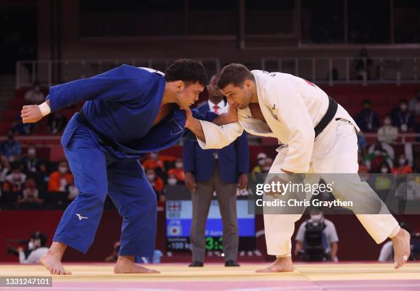 Aaron Wolf of Team Japan and Varlam Liparteliani of Team Georgia compete during the Men’s Judo 100kg Semifinal of Table A on day six of the Tokyo...