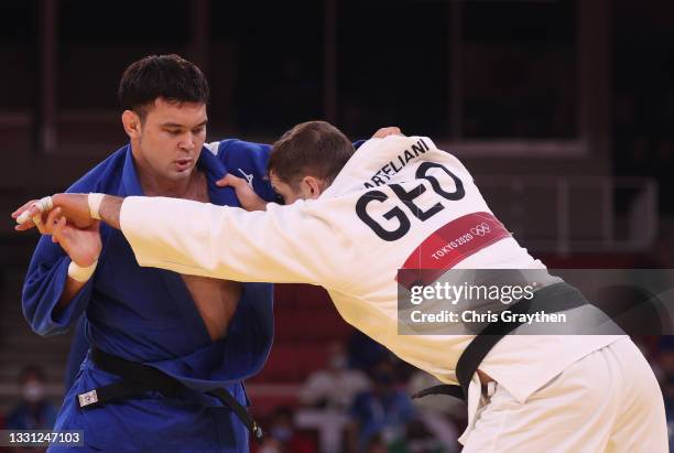 Aaron Wolf of Team Japan and Varlam Liparteliani of Team Georgia compete during the Men’s Judo 100kg Semifinal of Table A on day six of the Tokyo...