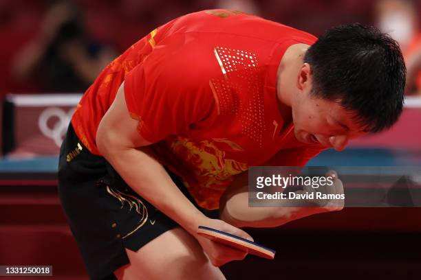 Ma Long of Team China reacts during his Men's Singles Semifinals match on day six of the Tokyo 2020 Olympic Games at Tokyo Metropolitan Gymnasium on...