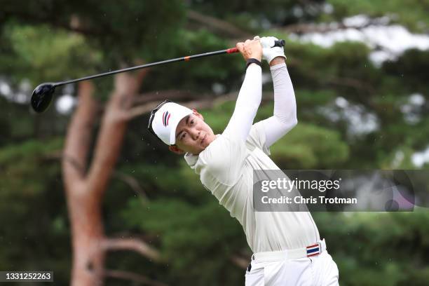 Jazz Janewattananond of Team Thailand plays his shot from the 18th tee during the first round of the Men's Individual Stroke Play on day six of the...