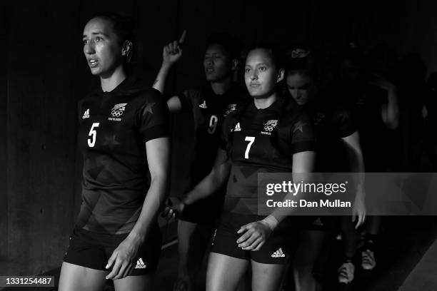 Sarah Hirini and Tyla Nathan-Wong of Team New Zealand walk out with their team before the Women’s pool A match between Team New Zealand and Team...