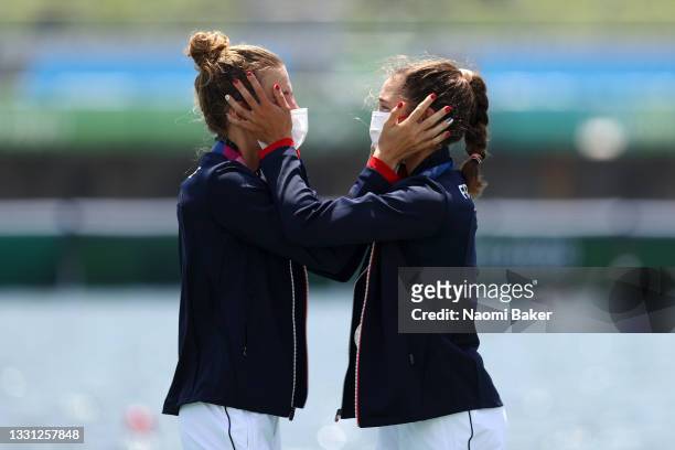 Laura Tarantola and Claire Bove of Team France celebrate on the podium after winning the Silver medal in the Lightweight Women's Double Sculls Final...