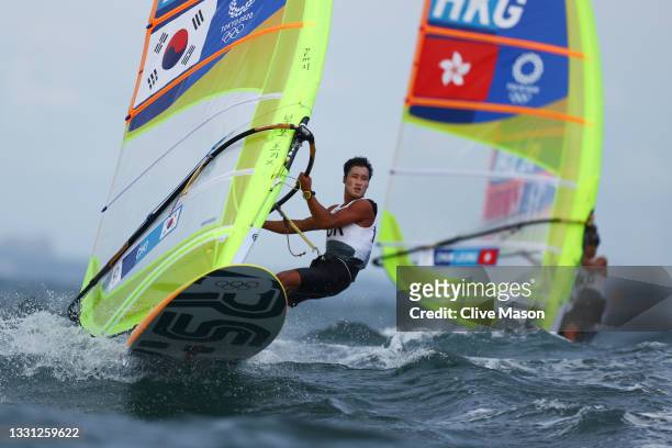 Wonwoo Cho of Team South Korea competes in the Men's RS:X windsurf class on day six of the Tokyo 2020 Olympic Games at Enoshima Yacht Harbour on July...