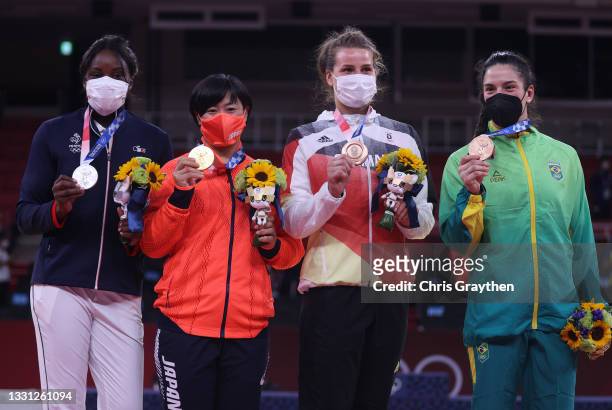 Silver medalist Madeline Malonga of Team France, gold medalist Shori Hamada of Team Japan, bronze medalist Anna-Maria Wagner of Team Germany and...