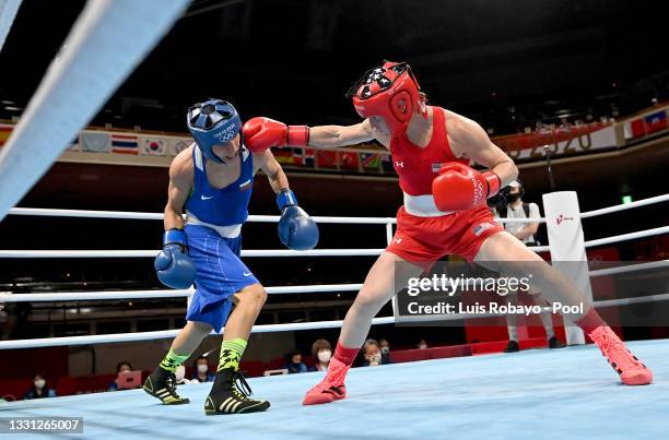 Virginia Fuchs of the United States exchanges punches with Stoyka Zhelyazkova Krasteva of Bulgaria during the Women's Fly on day six of the Tokyo...