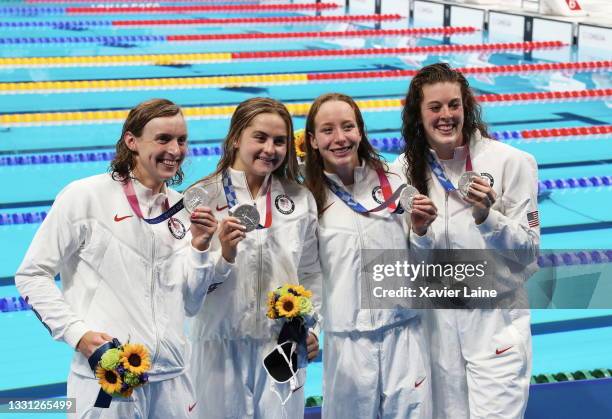 Katie Ledecky, Kathryn McLaughlin, Paige Madden and Allison Schmitt of Team United States pose with their medals after winning silver in the Women's...