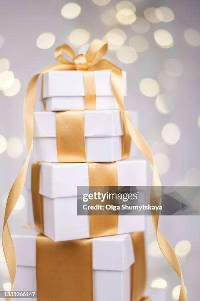 Present Stack Gold Gold Present Stack Photos and Premium High Res Pictures - Getty Images