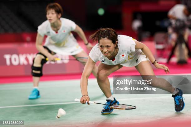 Yuki Fukushimafront) and Sayaka Hirota( of Team Japan compete against Chen Qing Chen and Jia Yi Fan of Team China during a Women’s Doubles...