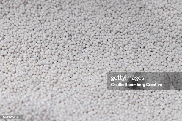 ground recycled plastic chips - polythene stock pictures, royalty-free photos & images