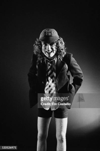 Lead guitarist Angus Young from Australian rock band AC/DC posed in a studio in London in August 1979.