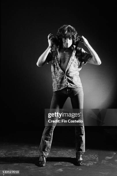 Lead singer Bon Scott from Australian rock band AC/DC posed in a studio in London in August 1979.