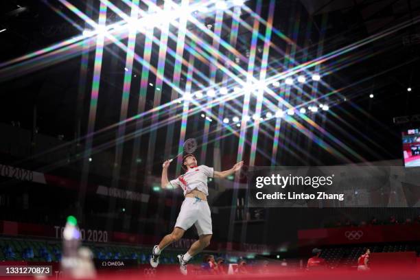 Shi Yu Qi of Team China competes against Jonatan Christie of Team Indonesia during a Men's Singles Round of 16 match on day six of the Tokyo 2020...