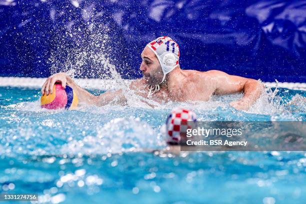 Paulo Obradovic of Croatia during the Tokyo 2020 Olympic Waterpolo Tournament Men's match between Team Croatia and Team Montenegro at Tatsumi...
