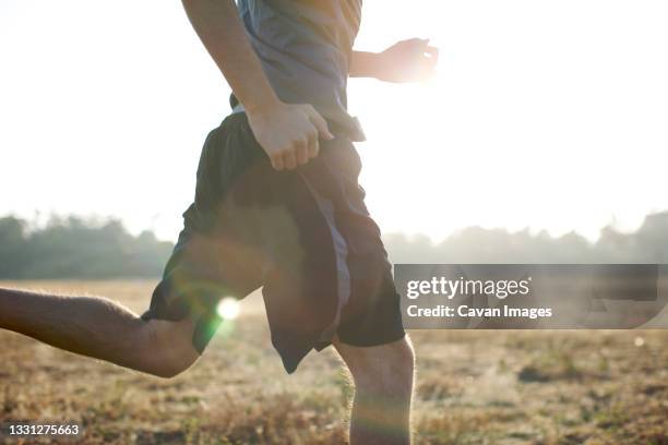 Running In Field 6,112 Man Open Field Stock Photos, High-Res Pictures, and Images ...