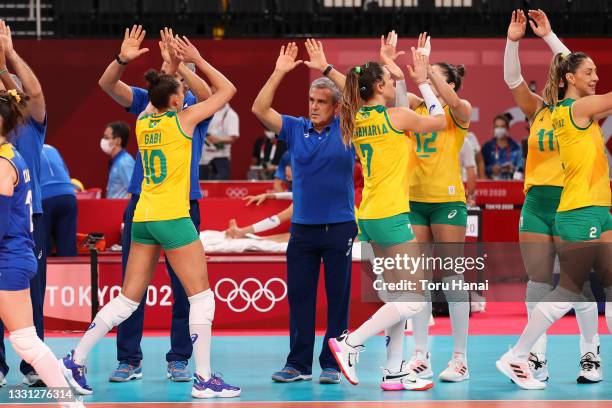 Jose Roberto Guimaraes, Head Coach of Team Brazil Team Andorra his team celebrate victory during the Women's Preliminary - Pool B volleyball match...