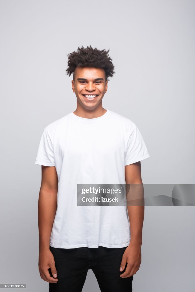 Friendly young man in white t-shirt