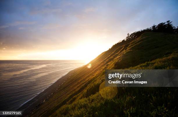 ebey's landing on whidbey island at sunset. - whidbey island stock pictures, royalty-free photos & images