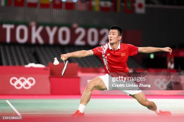 Chen Long of Team China competes against Lee Zii Jia of Team Malaysia during a Men's Singles Round of 16 match on day six of the Tokyo 2020 Olympic...