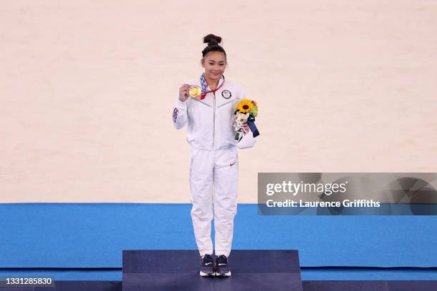 Sunisa Lee of Team United States poses with her gold medal after winning the Women's All-Around Final on day six of the Tokyo 2020 Olympic Games at...