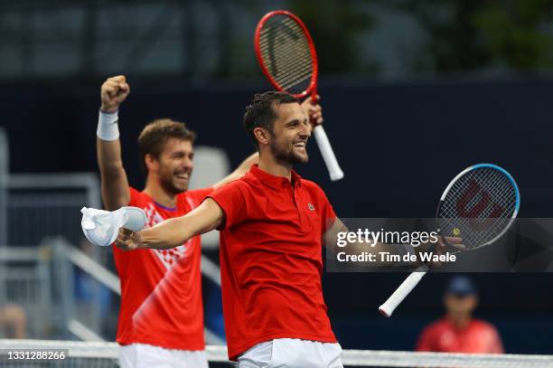 Mate Pavic of Team Croatia and Nikola Mektic of Team Croatia celebrate victory against Austin Krajicek of Team USA and Tennys Sandgren of Team USA...