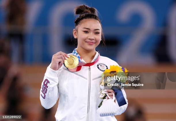 Sunisa Lee of Team United States poses with her gold medal after winning the Women's All-Around Final on day six of the Tokyo 2020 Olympic Games at...