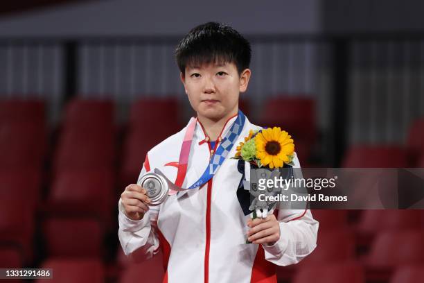 Sun Yingsha of Team China poses for photographs during the medal ceremony of the Women's Singles table tennis on day six of the Tokyo 2020 Olympic...
