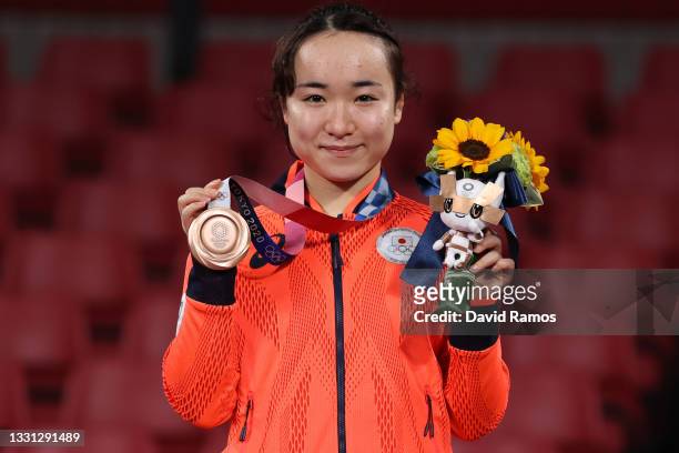 Ito Mima of Team Japan poses for photographs during the medal ceremony of the Women's Singles table tennis on day six of the Tokyo 2020 Olympic Games...